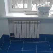 Установка батареи отопления